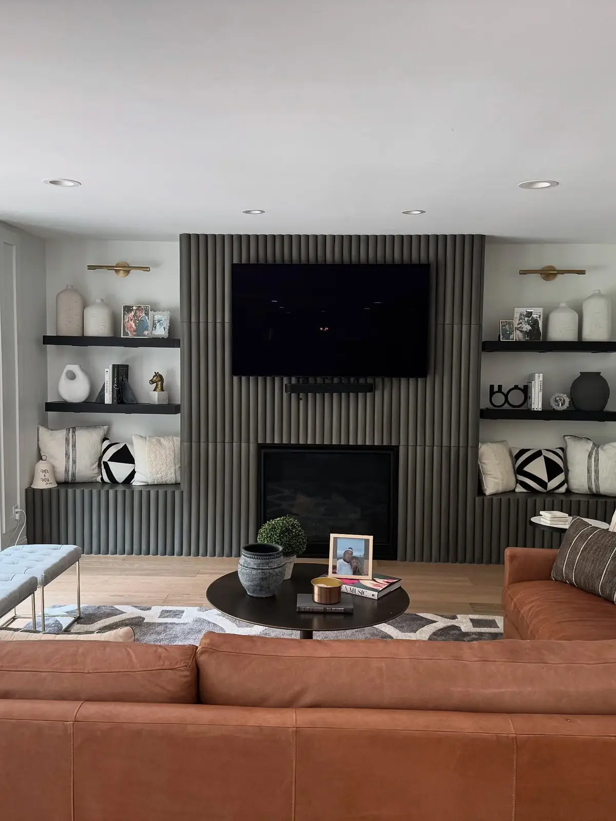 Fireplace wall with open shelving