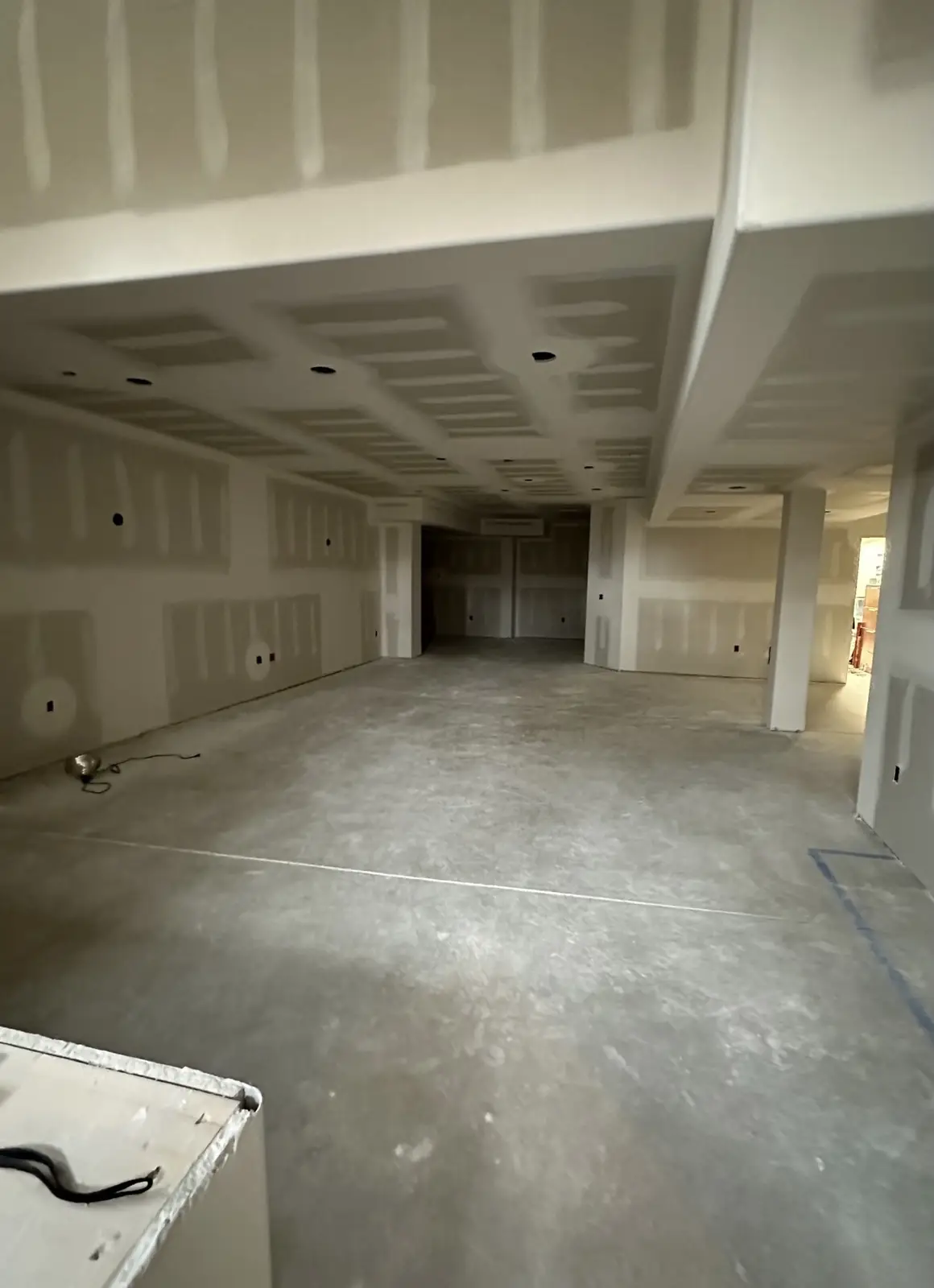 Theater before — bare drywall