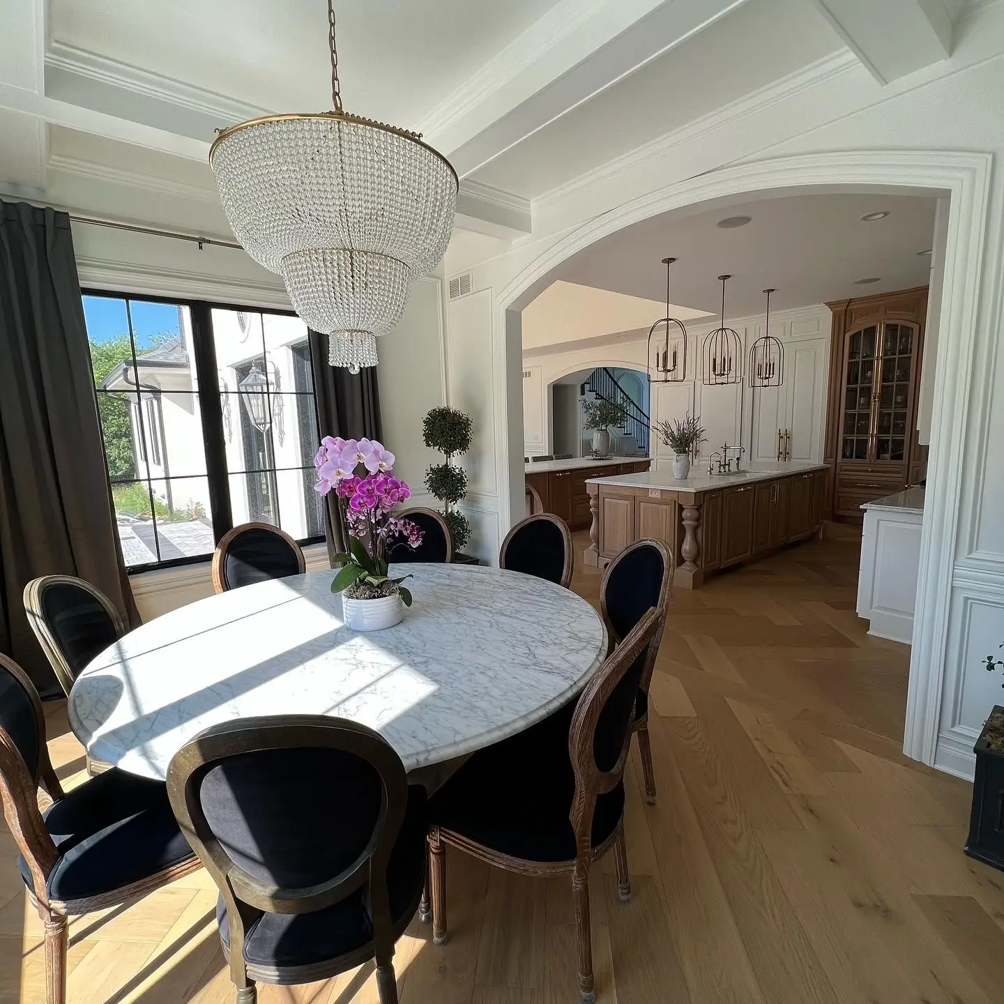 From the dining room through to the kitchen — French-Inspired Residence