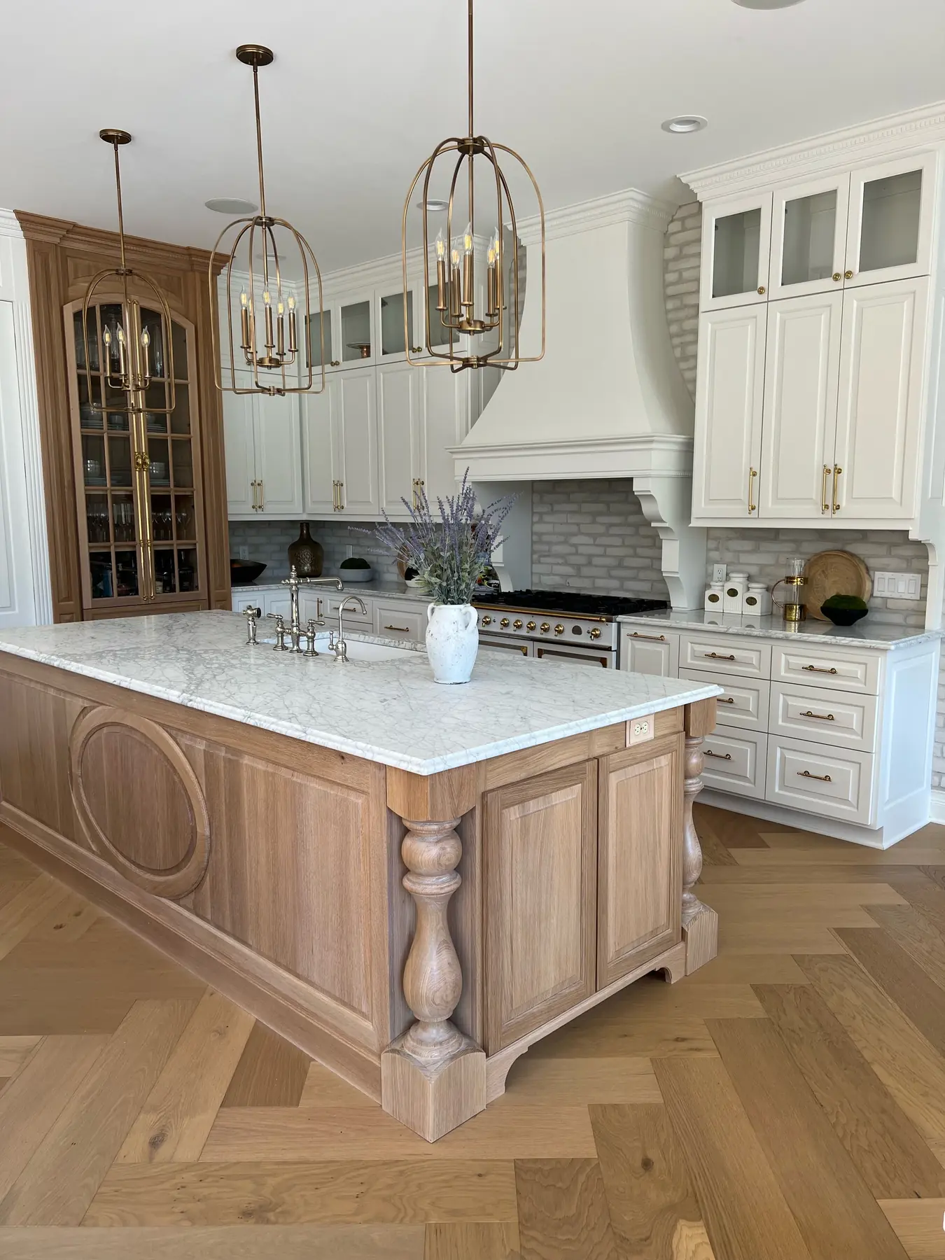 White oak kitchen island with an oval panel and turned legs