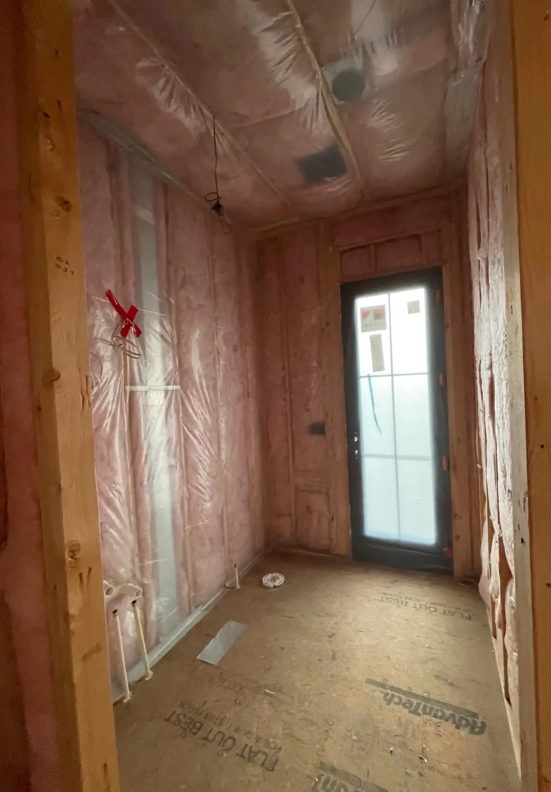 Powder room before — framing and drywall