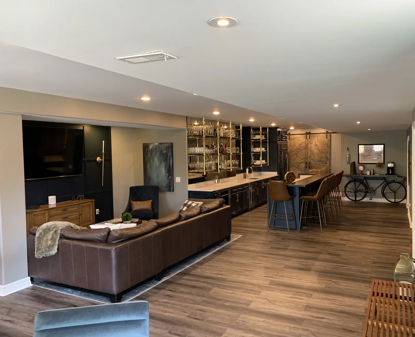 The basement after — the lounge and the bar beyond
