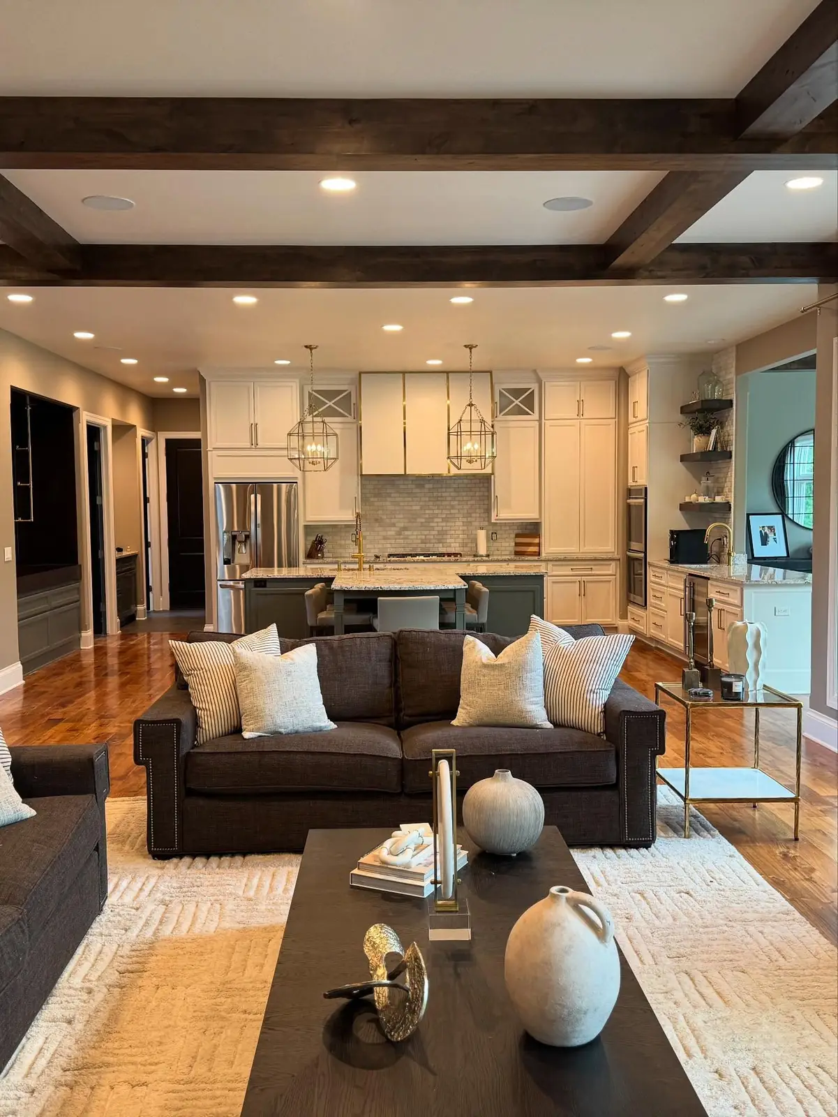 Open living space beneath dark beams