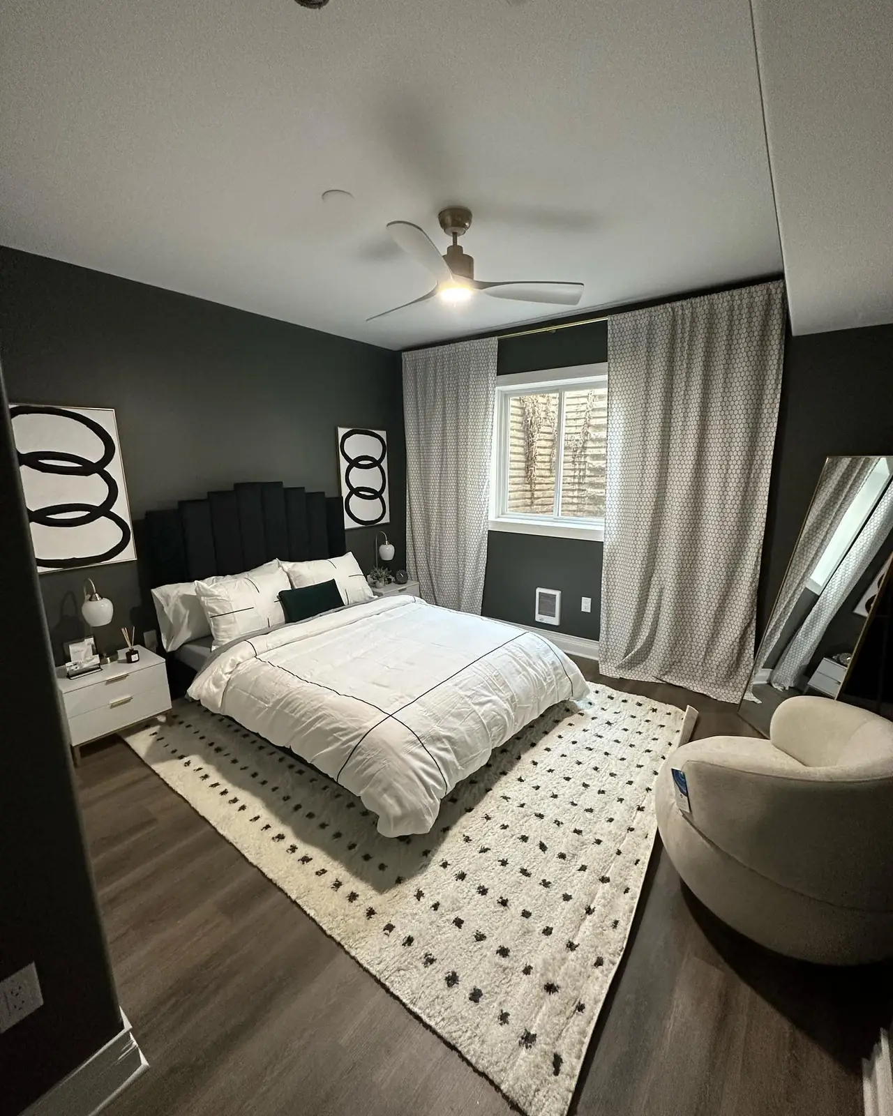 Charcoal guest bedroom with bold graphic art