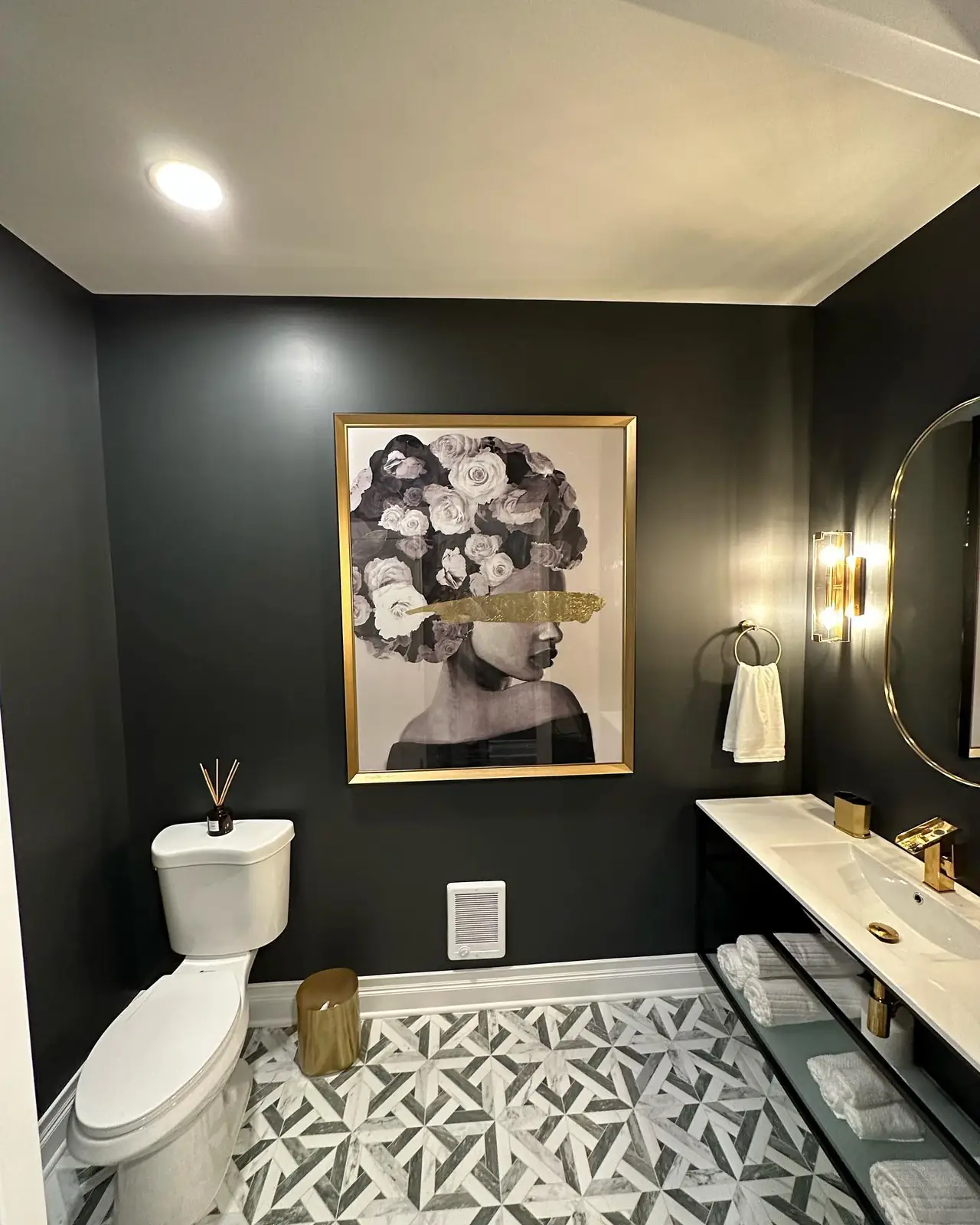 Bath with bold art and patterned tile