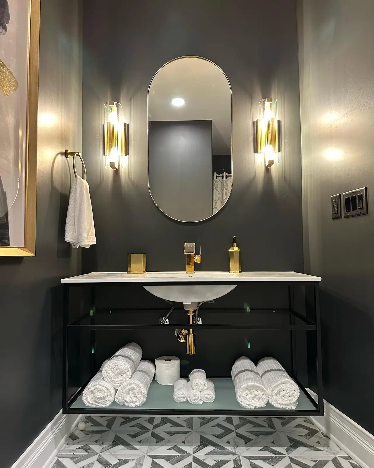 Black vanity with gold accents