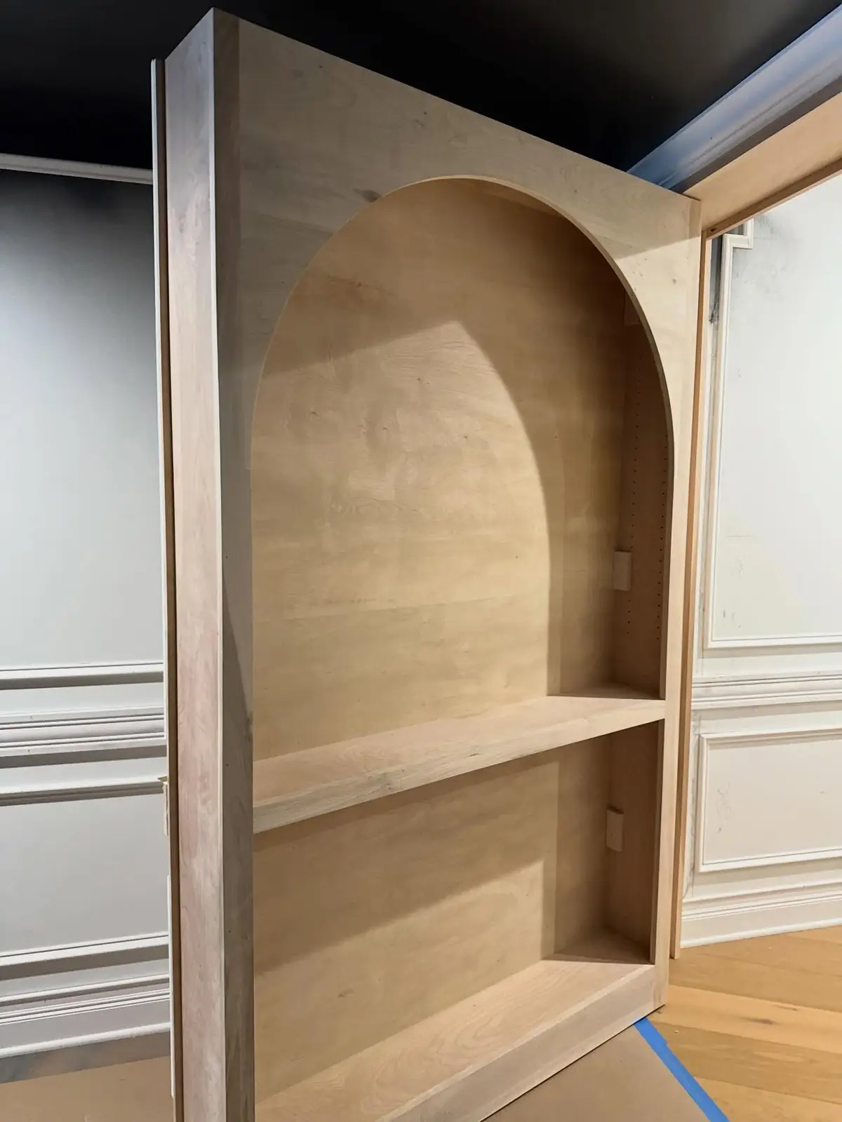 The bookcase door before paint